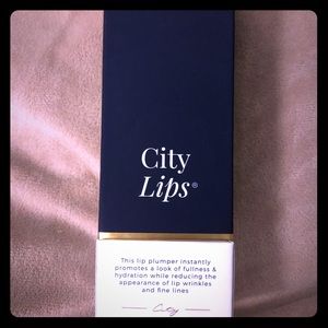 One Unopened tube of City Lips